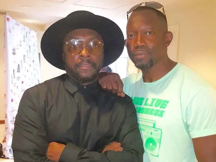 Hen-Gee Garcia with will.i.am at event